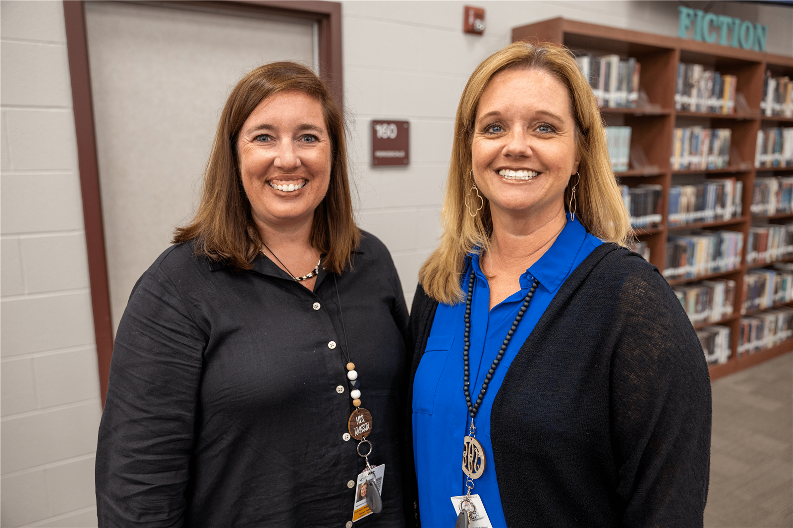 Principal and Vice Principal smiling
